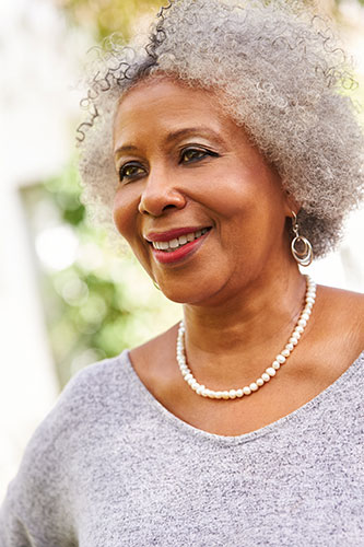 Our client Joy, a Black woman in her late 50s