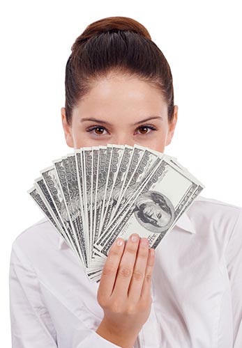 Woman holding a fan of cash, symbolizing the cash value component of whole life insurance