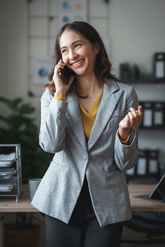 Life insurance agent on the phone, helping a client