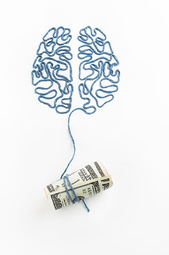 Diagram of brain made out of thread, tied to a roll of hundred dollar bills, symbolizing a smart way to get more money