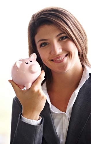 Woman holding a piggy bank and smiling